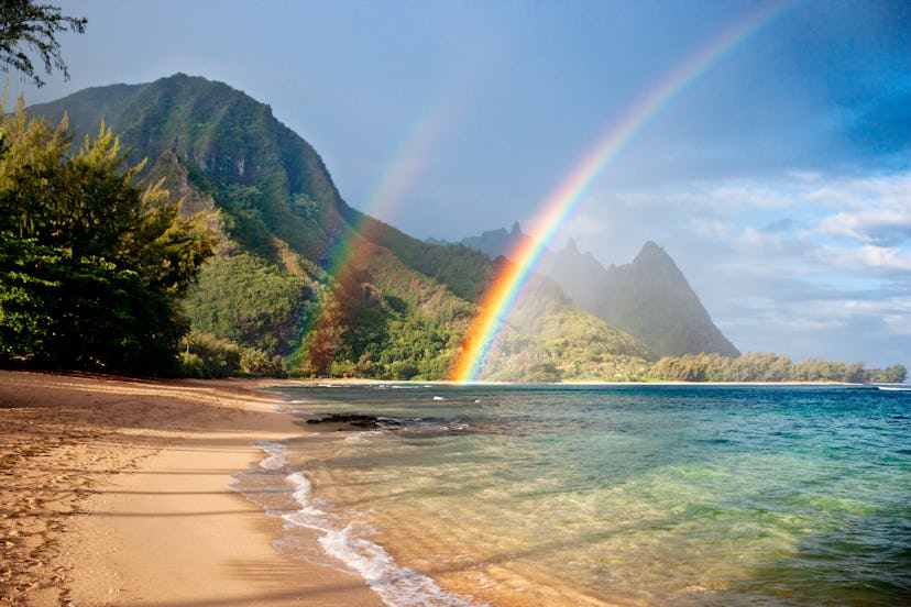 double rainbow at tunnels beach in kauai, hawaii in an article about rainbow baby announcements