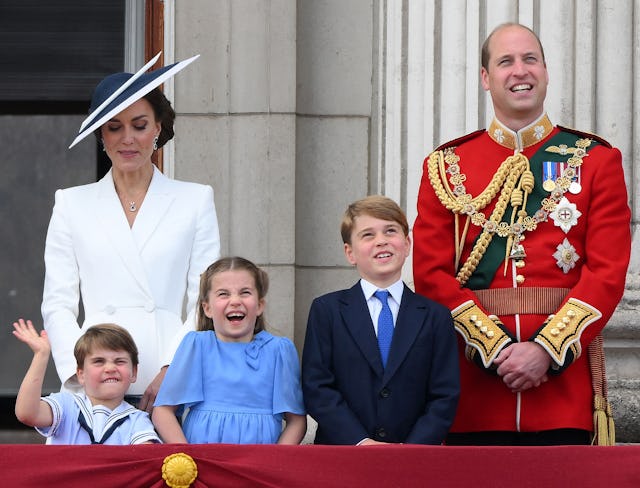 Britain's Catherine and  Prince William, Duke of Cambridge stand with their children, Prince Louis o...