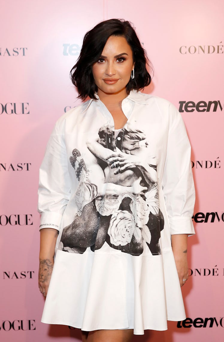 Demi Lovato Iconic Beauty Looks: her lined lips and big lashes at the Teen Vogue Summit 2019 on Nove...