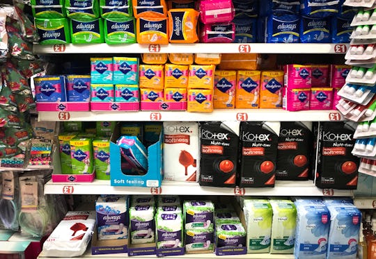 Sanitary products and tampons on sale in a Glasgow supermarket. Scotland was the first country to ma...