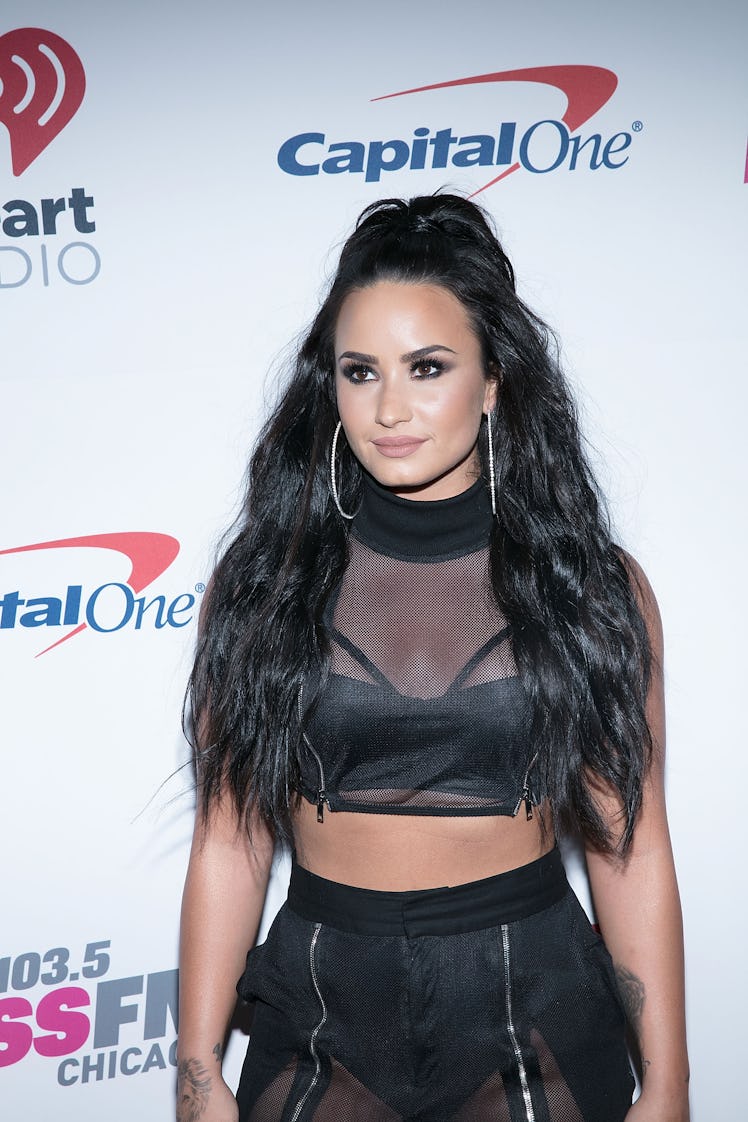 Demi Lovato Iconic Beauty Moment: the singer with a big ponytail and smokey eye at 103.5 KISS FM's i...
