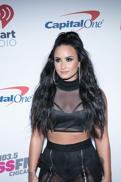 Demi Lovato Iconic Beauty Moment: the singer with a big ponytail and smokey eye at 103.5 KISS FM's i...
