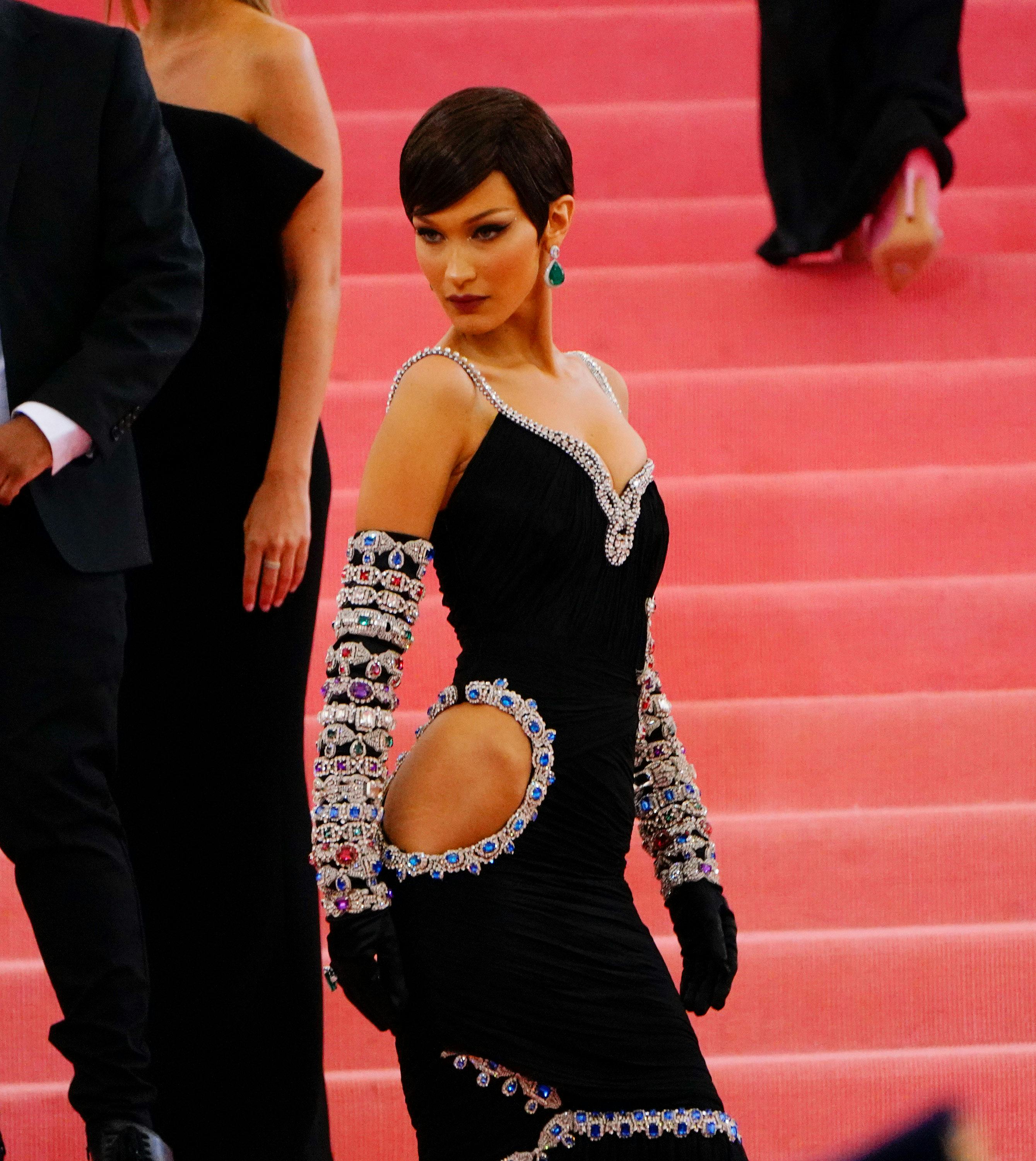 Bella Hadid showcasing the side part pixie.