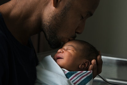 dad and newborn in the best advice for dads during labor