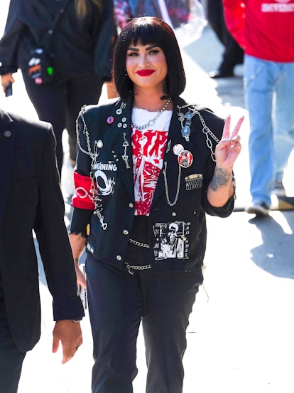 Demi Lovato Iconic Beauty Moment: her bob and bangs with a blood red lip as she arrived at 'Jimmy Ki...