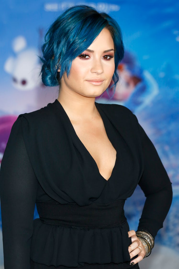 Demi Lovato Iconic Beauty Moments: her blue hair and pink makeup from the "Frozen" World Premiere on...