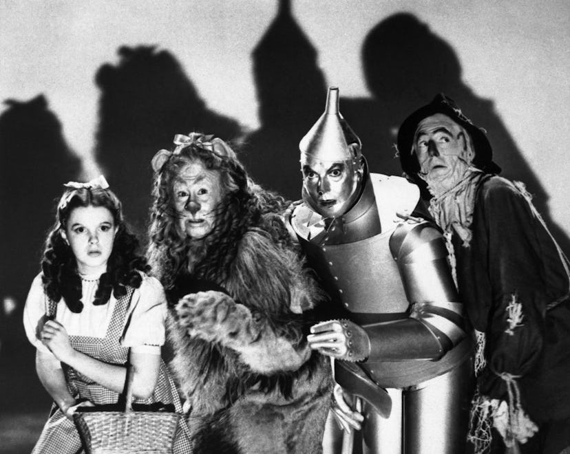 (Original Caption) The cast of the 1939 MGM production of "The Wizard of Oz" stand together during a...
