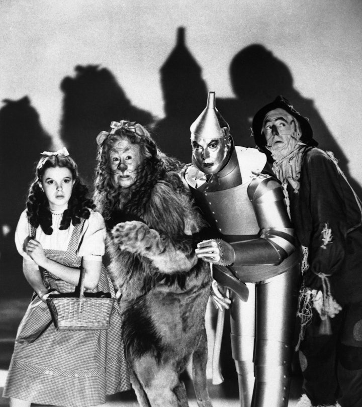 (Original Caption) The cast of the 1939 MGM production of "The Wizard of Oz" stand together during a...