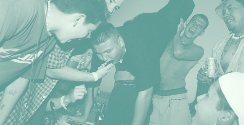 386746 02: Students consume beer from a keg March 15, 2001 during Spring Break 2001 on South Padre I...