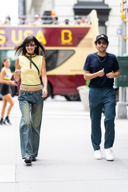 Bella Hadid (L) and Ramy Youssef walking in New York City 