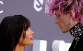 US rapper Machine Gun Kelly and US actress Megan Fox attend the 2022 Billboard Music Awards at the M...