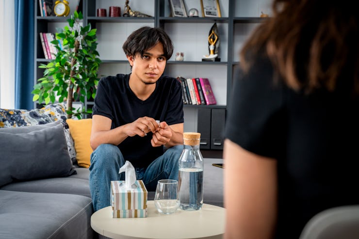 middle eastern teenager having psychotherapy session at psychologist's office