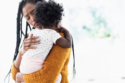 a mom and toddler snuggling. what to do if in-laws dont help with grandchildren