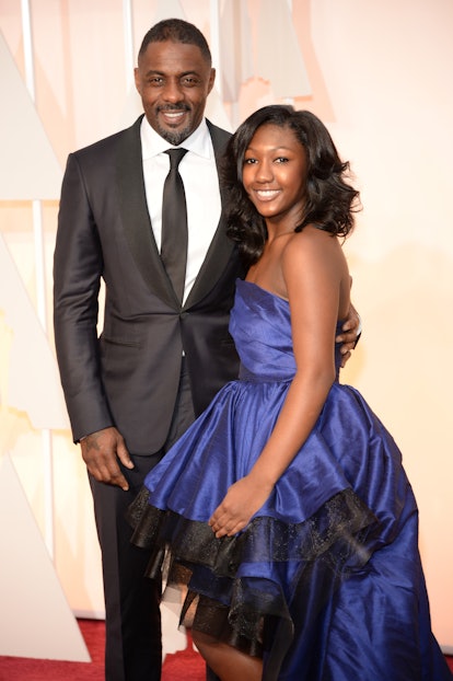 HOLLYWOOD, CA - FEBRUARY 22:  Actor Idris Elba and Isan Elba attend the 87th Annual Academy Awards a...