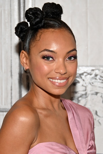 Logan Browning wears a bantu-knot mohawk to discuss Build "perfection" In Build Studio in May...