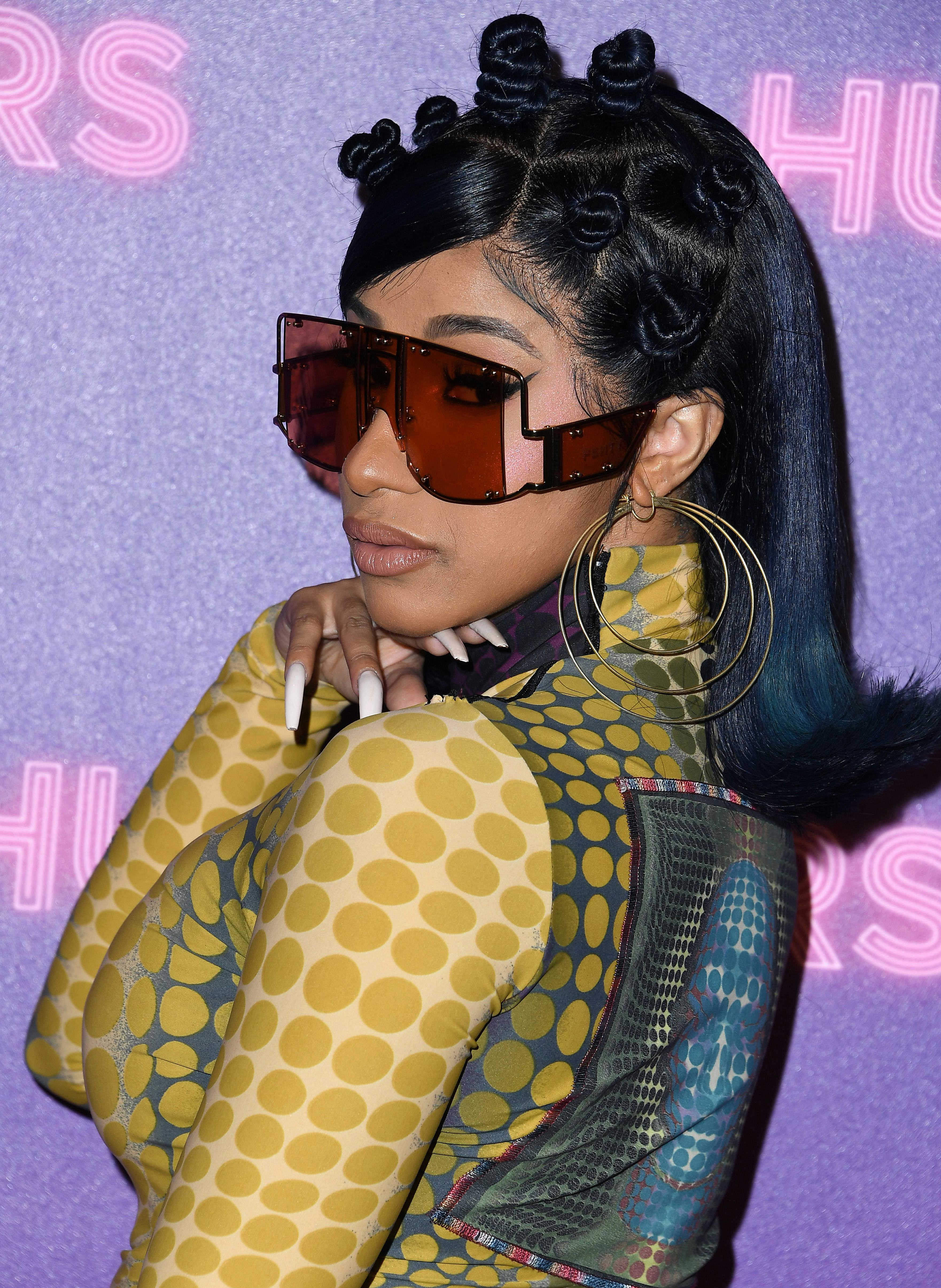 Cardi B wears bantu knots at the Photo Call For STX Entertainment&rsquo;s &ldquo;Hustlers&rdquo; in 2019 in Los Angele&hellip;
