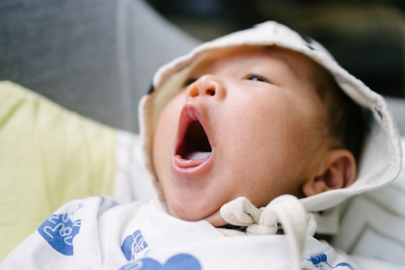 newborn baby mid-cough, what it means if baby is coughing or throwing up phlegm