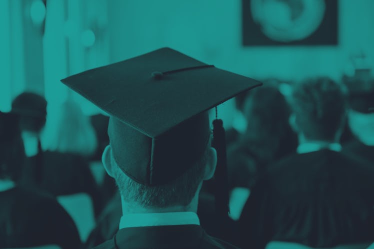 29 July 2022, Baden-Wuerttemberg, Mannheim: A man wears a graduation hat at a graduation ceremony of...