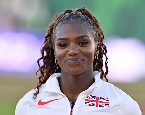 Dina Asher-Smith of Team Great Britain poses during medal ceremony for the Women's 200m Final 