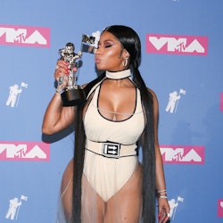 NEW YORK, NY - AUGUST 20:  Rapper Nicki Minaj holds her award for best hip-hop video in the press ro...