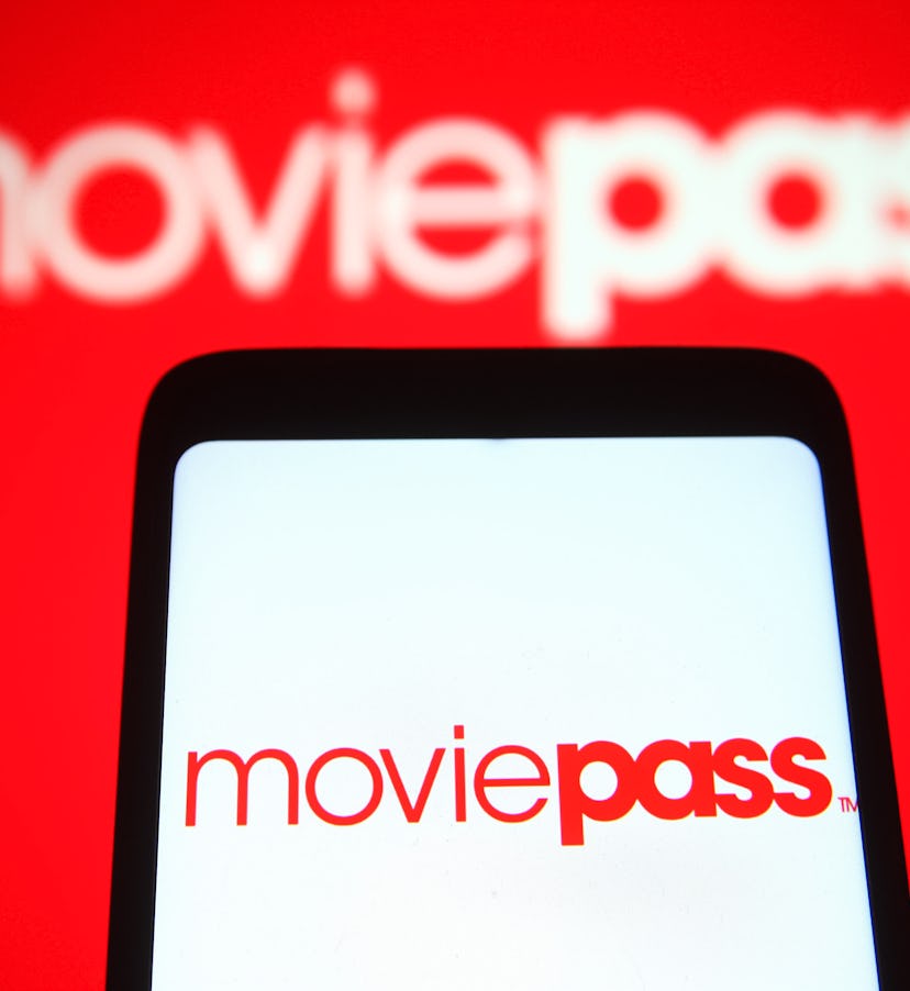 UKRAINE - 2021/11/14: In this photo illustration, a MoviePass Inc. logo is seen on a smartphone and ...