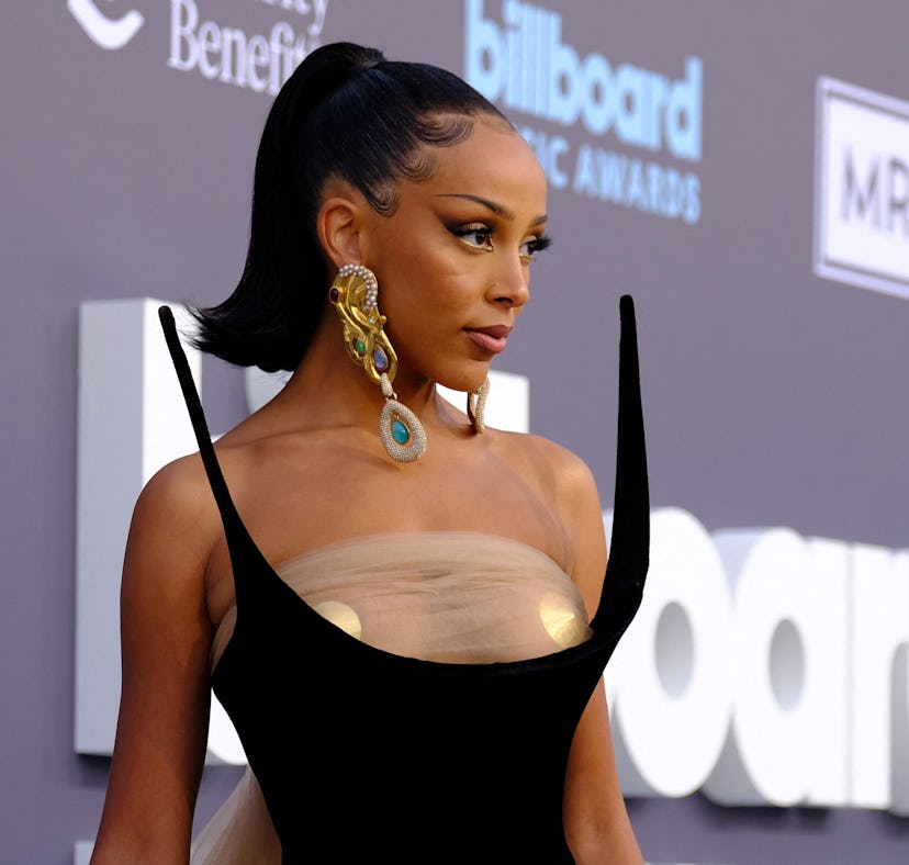 Doja Cat's clothing line is drawing Dunkin' comparisons for a big similarity.