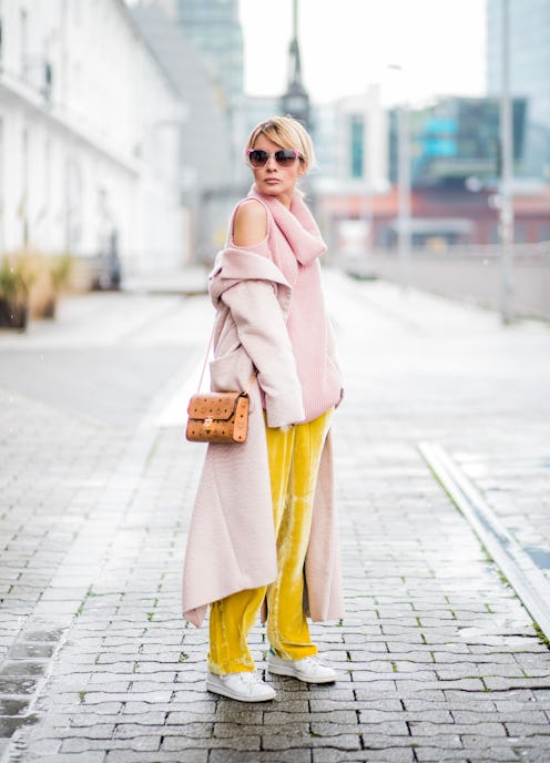 DUESSELDORF, GERMANY - DECEMBER 08: Gitta Banko wearing a pink cashmere turtleneck sweater with cut-...