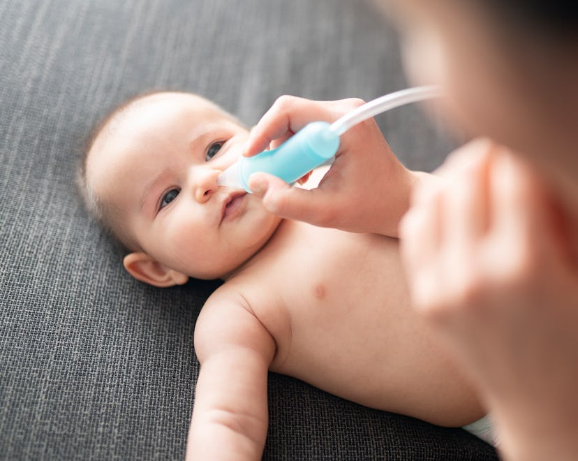 Newborn baby and nose drops