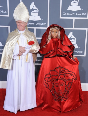 Singer Nicki Minaj (R) arrives at 54th Annual GRAMMY Awards