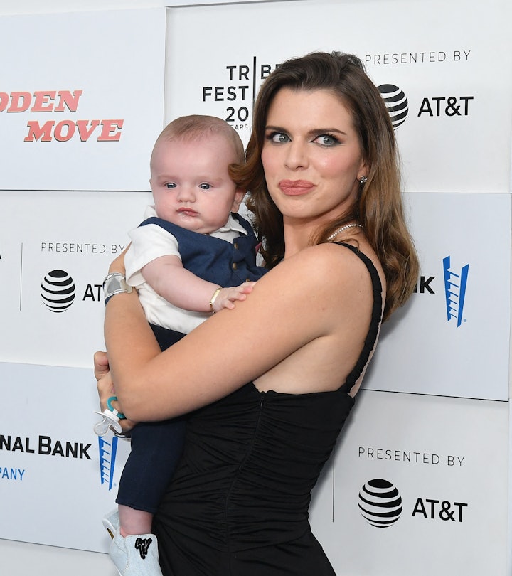 Italian-US actress Julia Fox holds her son Valentino as she attends the premiere of "No Sudden Move"...
