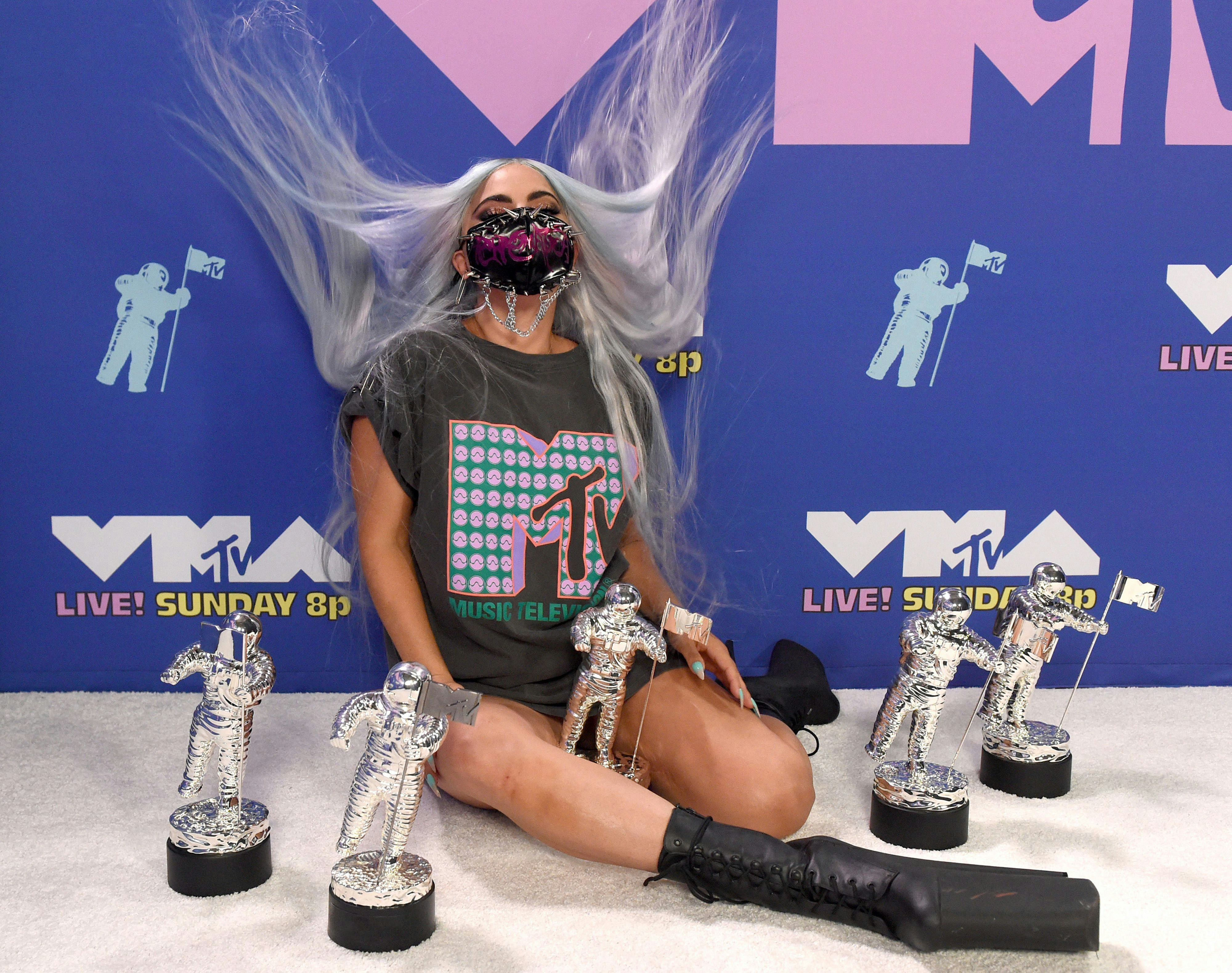 Lady Gaga poses with her awards during the 2020 MTV Video Music Awards, broadcast on Sunday, August &hellip;