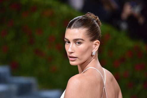 Hailey Bieber showed off her glossy brown lipstick look (aka glazed brownie lips) on TikTok. It's a ...