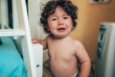 A toddler throwing a tantrum.