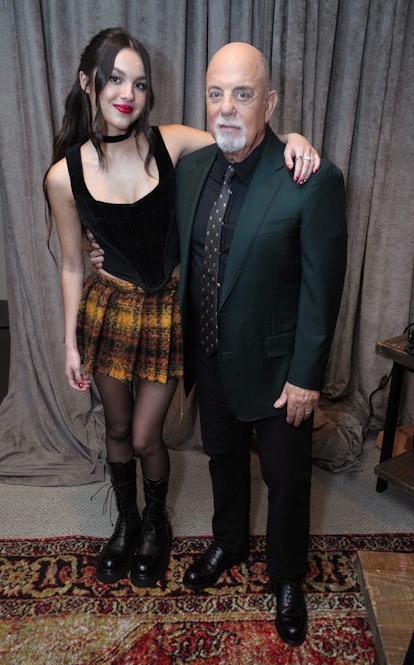 NEW YORK, NEW YORK - AUGUST 24: (Exclusive Coverage) Olivia Rodrigo and Billy Joel pose backstage at...