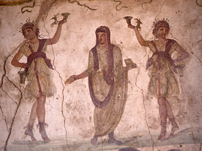 In the Villa of the Vettii in Pompeii we see a fresco in the lararium where a shrine to Roman guardi...