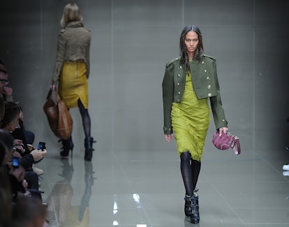 Models wear creations during the Burberry Womenswear fashion show for the Autumn/Winter 2010 collect...