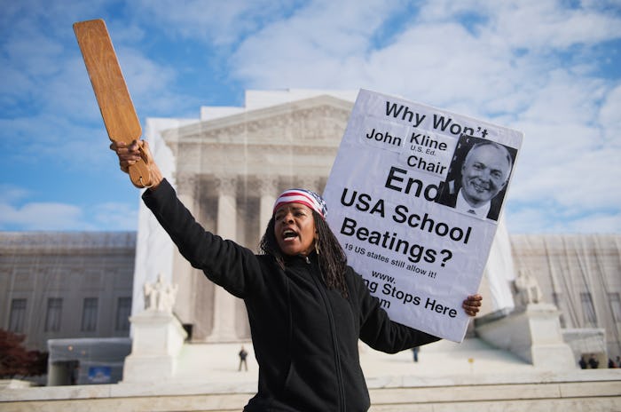 Paula Flowe of New York City, draws attention to a bill in Congress that would outlaw corporal punis...