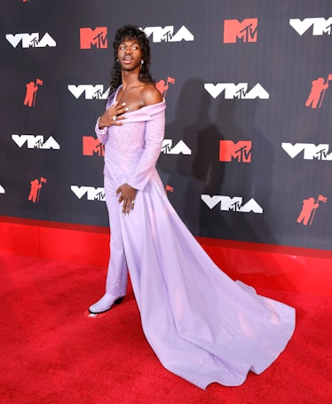 Lil Nas X Style Evolution: Lil Nas X wore a lilac suit with a shimmering train to the 2021 MTV Video...