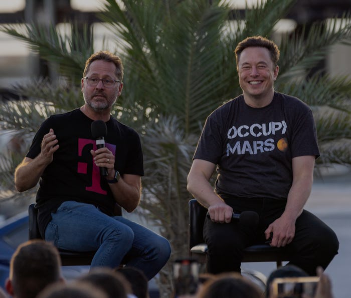 BOCA CHICA BEACH, TX - AUGUST 25: SpaceX founder Elon Musk and T-Mobile CEO Mike Sievert on stage du...