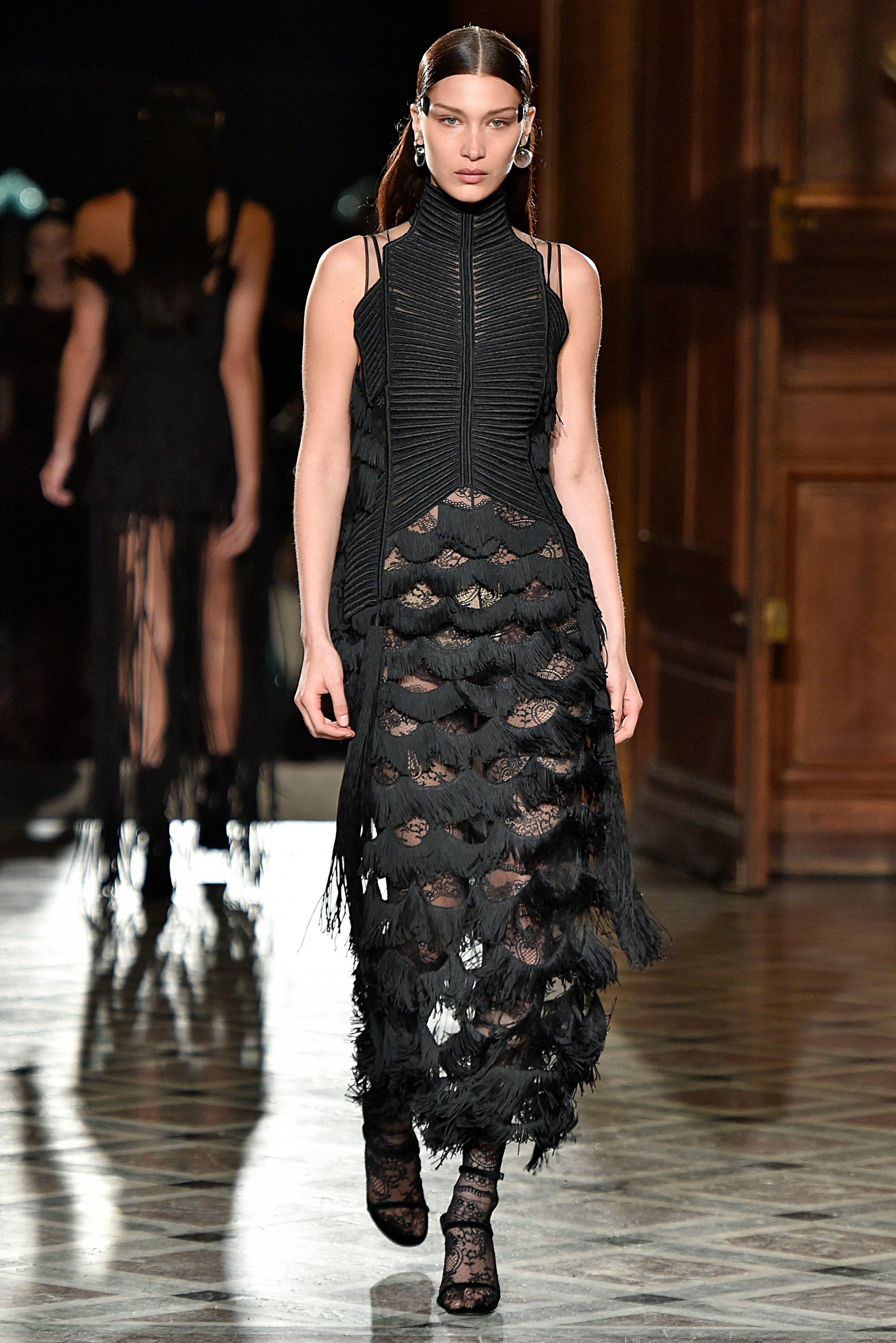 Bella Hadid walks the runway during the Givenchy Menswear Fall/Winter 2017-2018 show