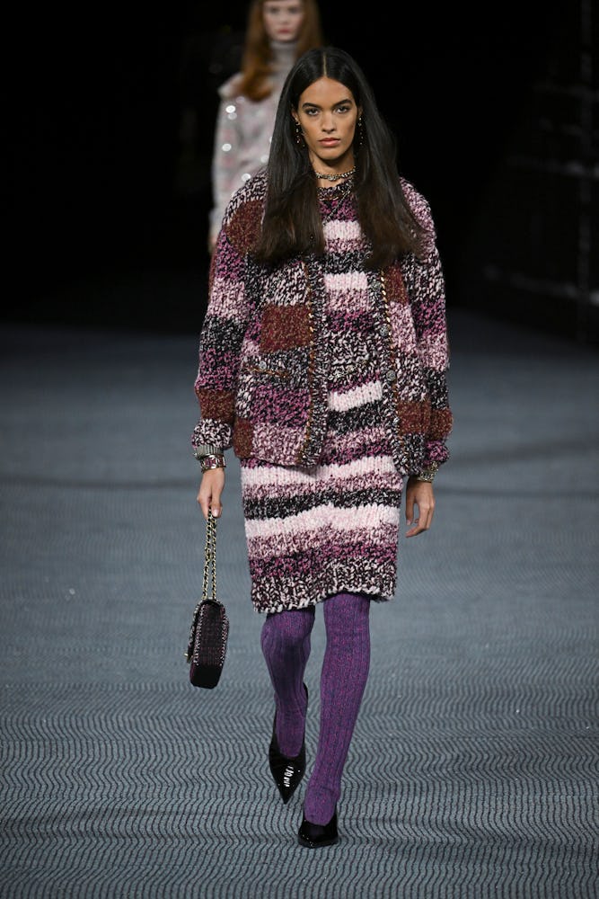 PARIS, FRANCE - MARCH 08: A model walks the runway during the Chanel Ready to Wear Fall/Winter 2022-...