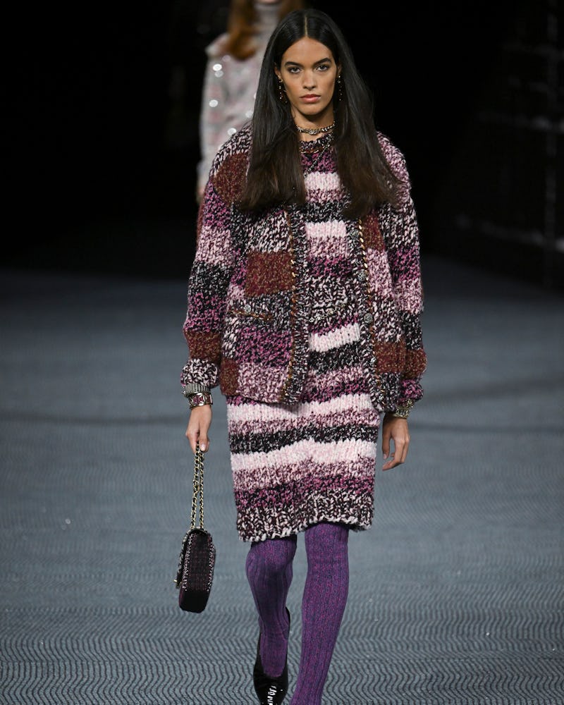 PARIS, FRANCE - MARCH 08: A model walks the runway during the Chanel Ready to Wear Fall/Winter 2022-...