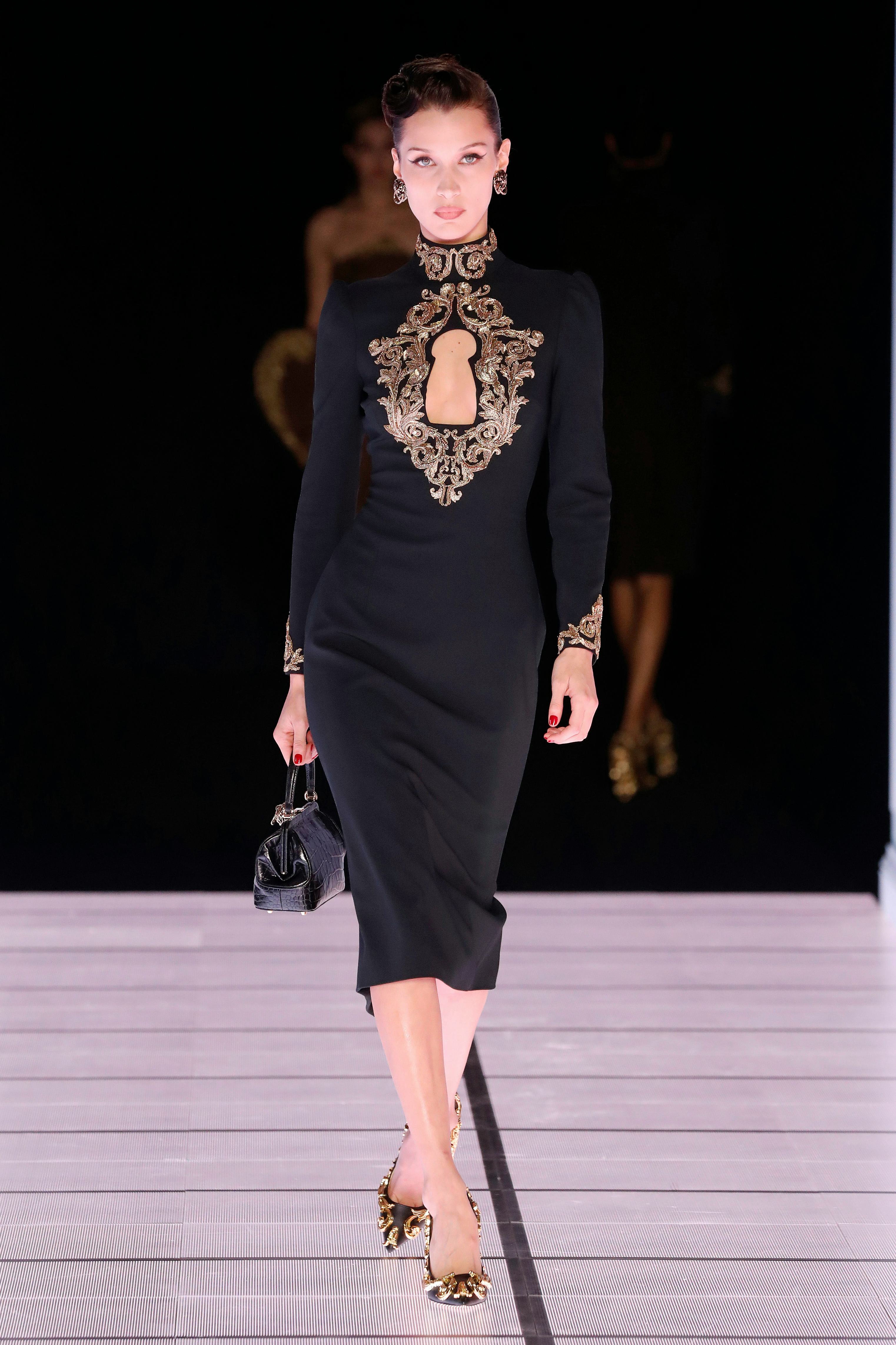 Model Bella Hadid walks the runway at the Moschino fashion show during the Milan Fashion Week Fall/W&hellip;