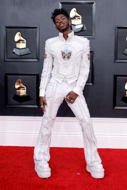 Lil Nas X Style Evolution: Lil Nas X wore a pearl-studded suit to the the 64th Annual GRAMMY Awards ...