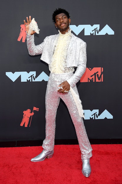 Lil Nas X Style Evolution: Lil Nas X channeled Prince with his 2019 VMAs look from August 26, 2019.