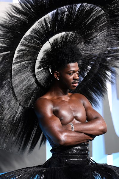 Lil Nas X's 2022 MTV VMAs outfit involved a huge hat on August 28, 2022.