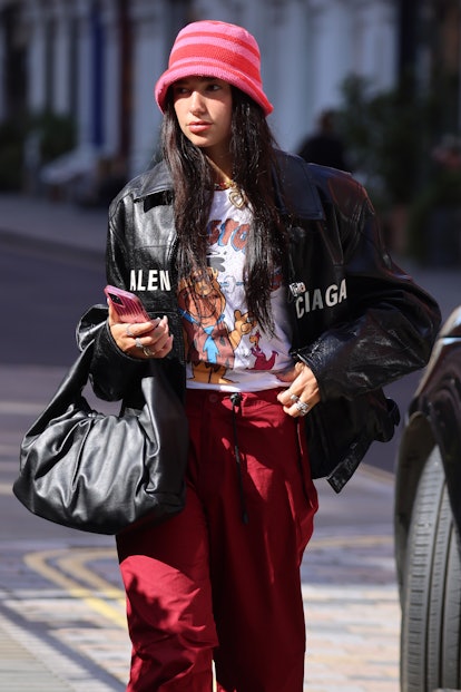 Dua Lipa seen arriving back at a hotel on August 25, 2021 in London, England