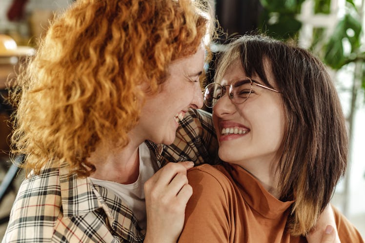 two women share a laugh together as they discuss each of their sept. 5 2022 weekly horoscopes