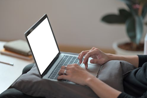 typing on laptop