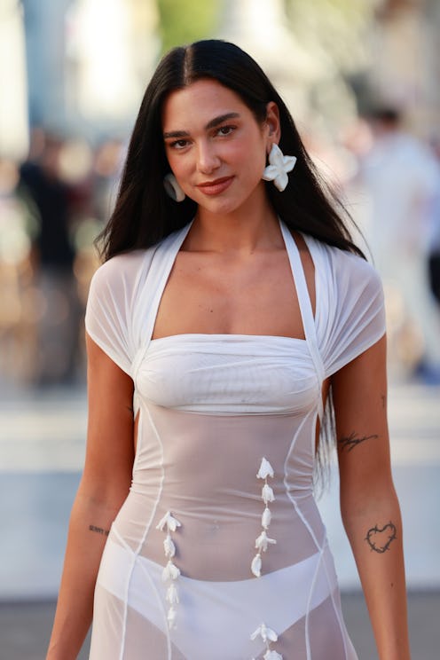 Dua Lipa wore pastel-colored French tips, and it was the sweetest summer wedding guest manicure.